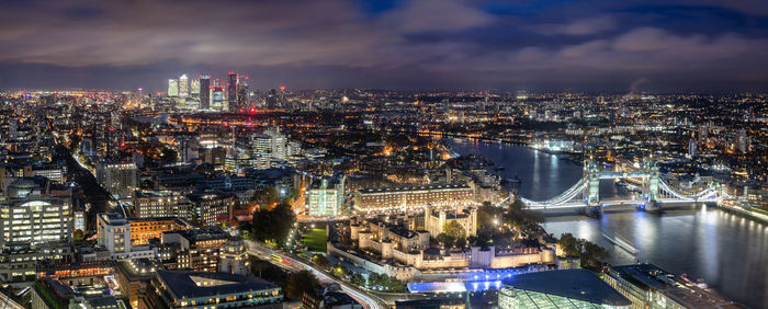 Aerial view of illuminated city buildings