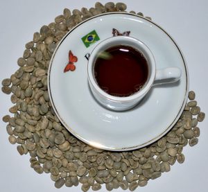 Close-up of drink coffee over white background