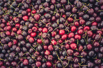 Full frame shot of cherries for sale at market