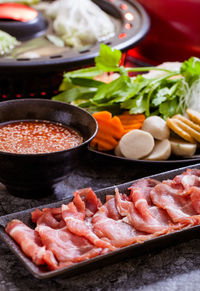 Close-up of meat and vegetables on table