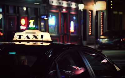 View of illuminated car in city at night