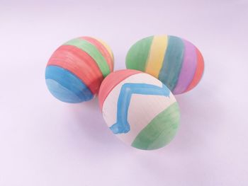 High angle view of multi colored pencils on white background