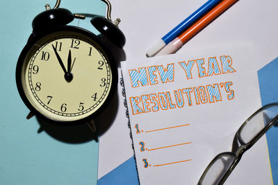 Close-up of clock on table