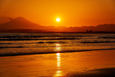 Scenic view of sea against sky during sunset