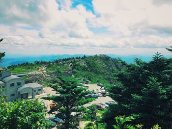 Scenic view of mountains against cloudy sky