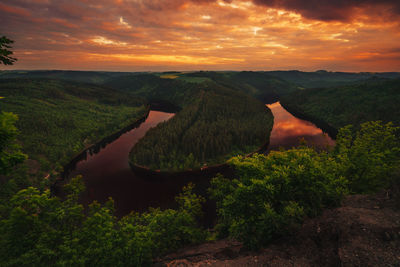 Scenic view of landscape against sky during sunset