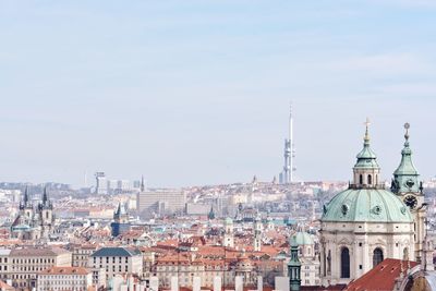 View of buildings in city against sky