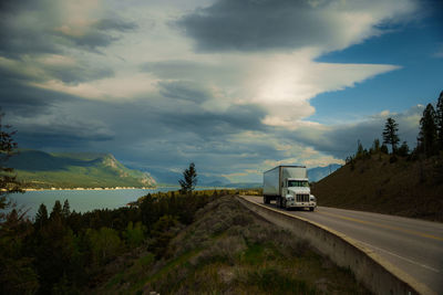 Trzck on road against sky at sunset 