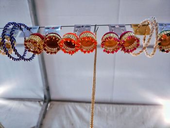 Close-up of heart shape hanging on table