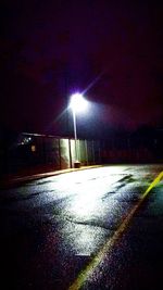 Illuminated street lights at night