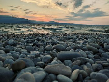 Scenic view of sea against cloudy sky