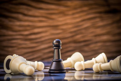 Close-up of chess pieces on board