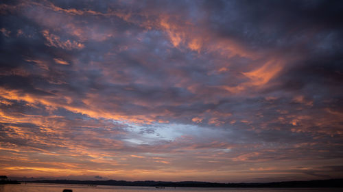 Low angle view of dramatic sky during sunset