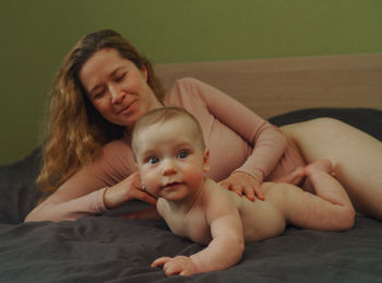 Portrait of mother and baby girl