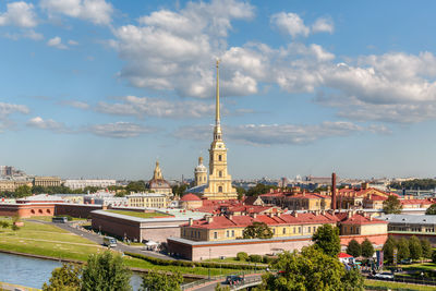 Colorful photo of peter and paul fortress in saint petersburg, russia. blue cloudy sky. copy space.