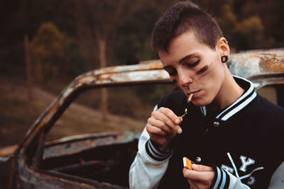 Portrait of young man looking down