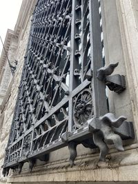 Low angle view of statue against building