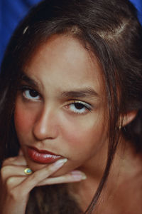 Close-up portrait of young woman