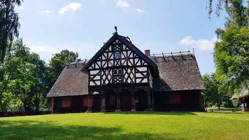 House on field against sky