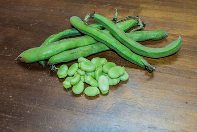 High angle view of green chili on table