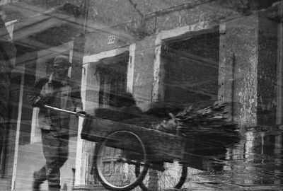 Reflection of building on glass window