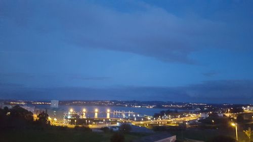 Illuminated cityscape at night