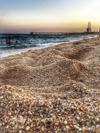 View of calm beach against sky