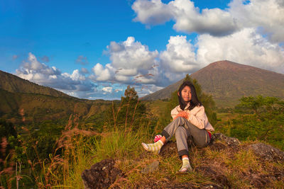 Young woman standing on mountain