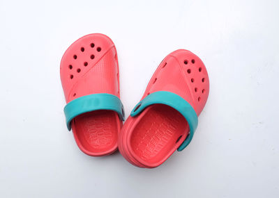 Colorful children's rubber sandals isolated on the white background.children's fashion slippers