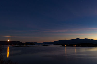 Scenic view of sea against sky at night