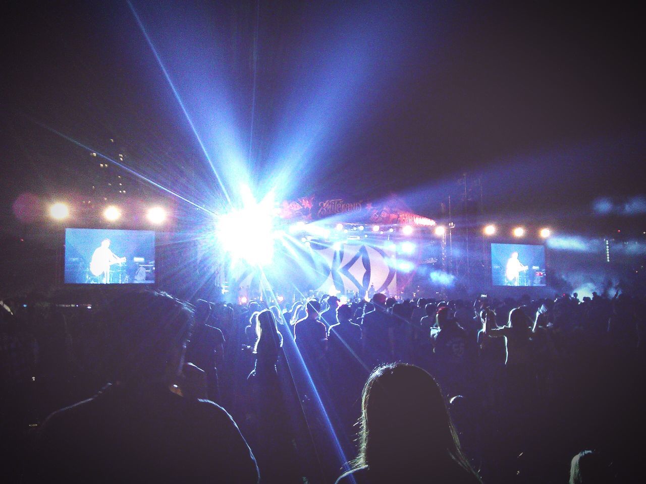 illuminated, large group of people, night, crowd, lifestyles, men, leisure activity, nightlife, arts culture and entertainment, music, person, enjoyment, performance, youth culture, event, concert, music festival, light - natural phenomenon