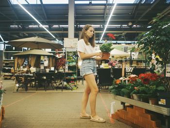 Woman standing at store