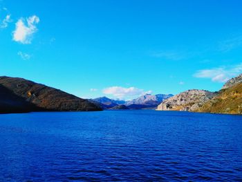 Scenic view of sea against blue sky