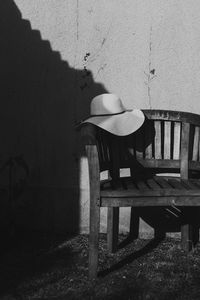 Rear view of woman sitting on chair