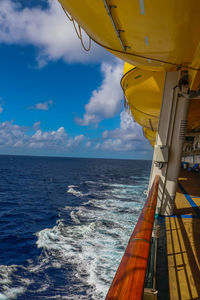 Ferry boat in sea against sky