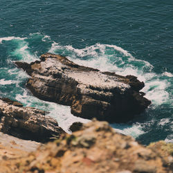 High angle view of rocks on beach