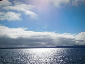 Scenic view of sea against cloudy sky