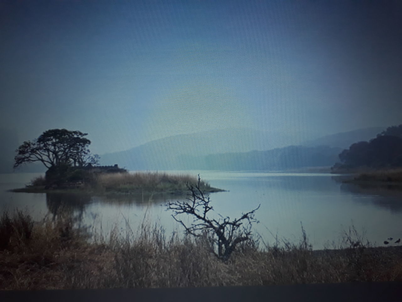 reflection, water, morning, dawn, scenics - nature, tranquility, sky, beauty in nature, tranquil scene, tree, lake, mist, nature, plant, no people, fog, environment, landscape, sunrise, cloud, land, mountain, horizon, non-urban scene, outdoors, beach, idyllic, darkness, travel destinations