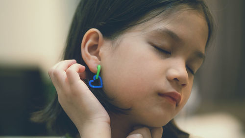 Close-up portrait of cute girl