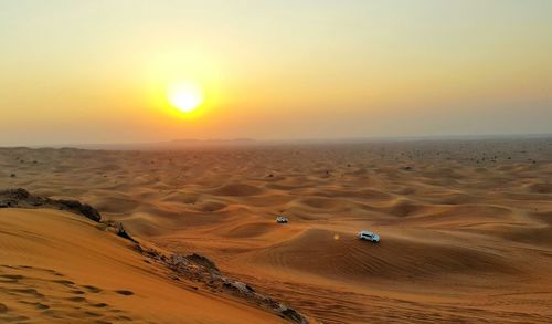 Scenic view of landscape at sunset