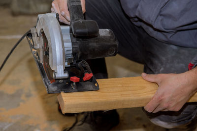 Man working on wood