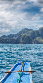 Boat in sea against sky