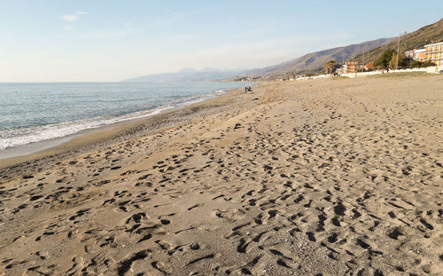 Scenic view of beach against sky