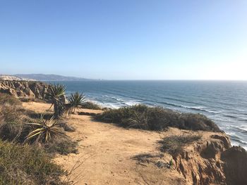 Scenic view of sea against clear sky