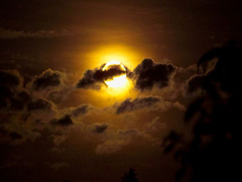 Low angle view of cloudy sky at sunset
