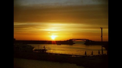 Scenic view of sea at sunset