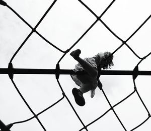 Low angle view of chainlink fence