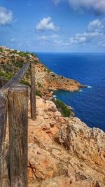 Scenic view of sea against cloudy sky