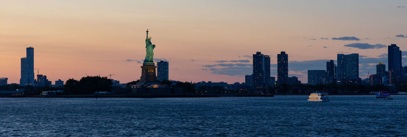 Statute of liberty at sunset