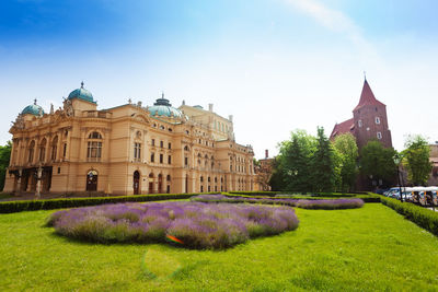 View of historical building in garden